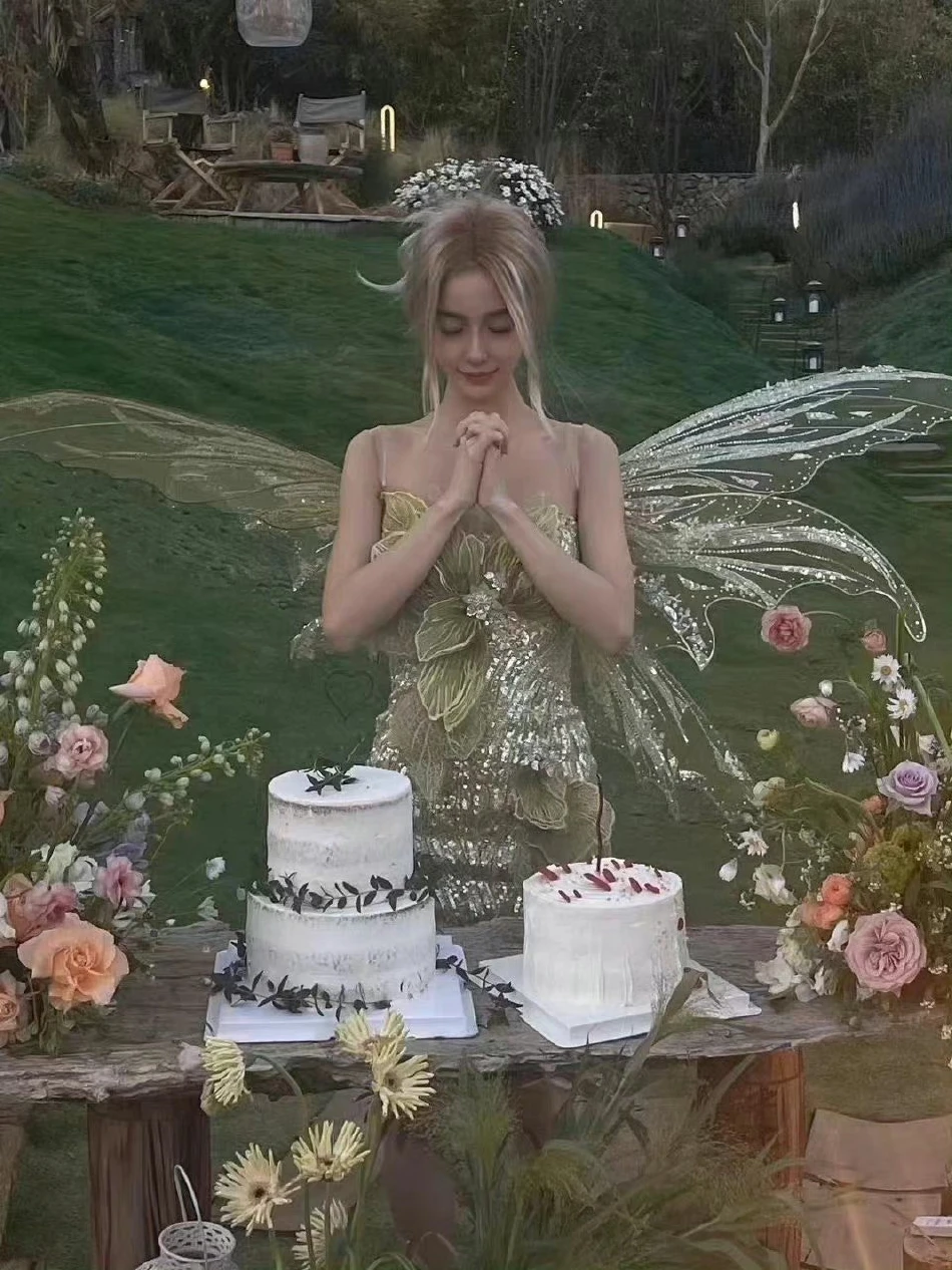 Angelababy生日现场照曝光,身穿绿色闪光裙宛若精灵少女 Angelababy生日现场照曝光,身穿绿色闪光裙宛若精灵少女